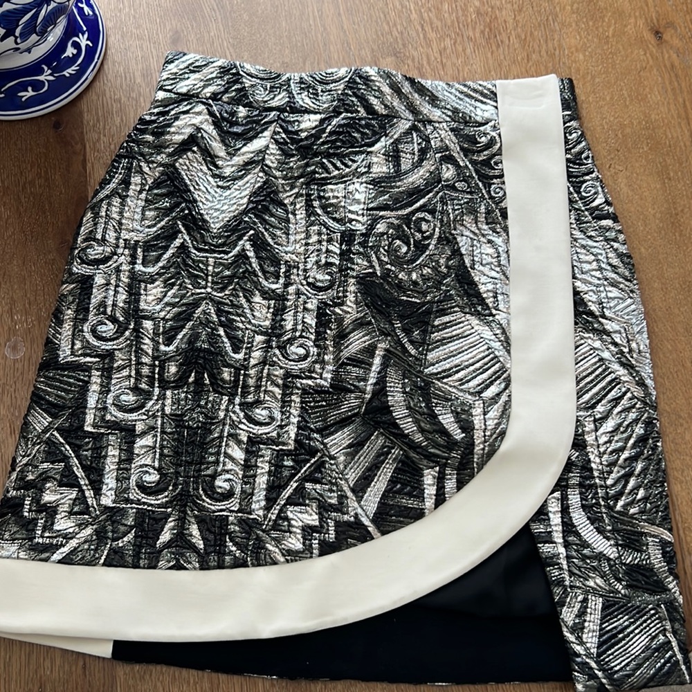 Authentic Never worn since the size was too small.